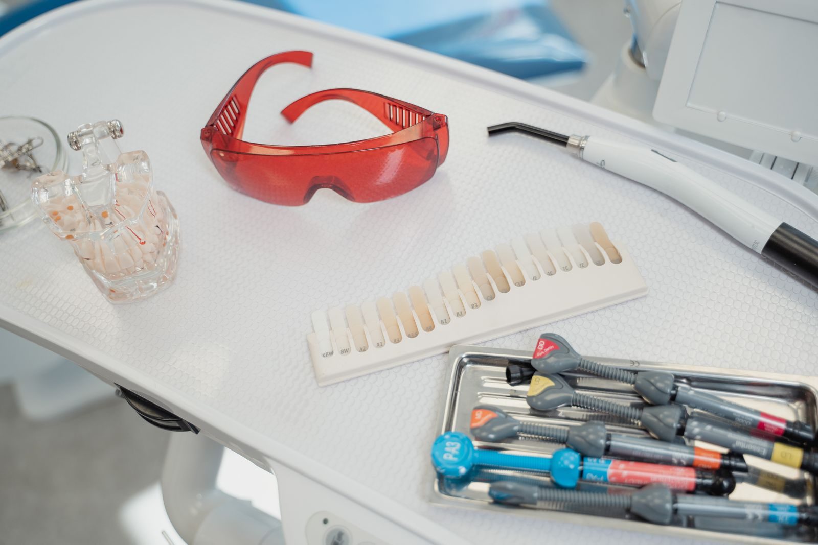 Orthodontic instruments on a dental tray.